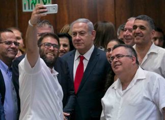 Netanyahu and others taking selfie after the bill in parliament