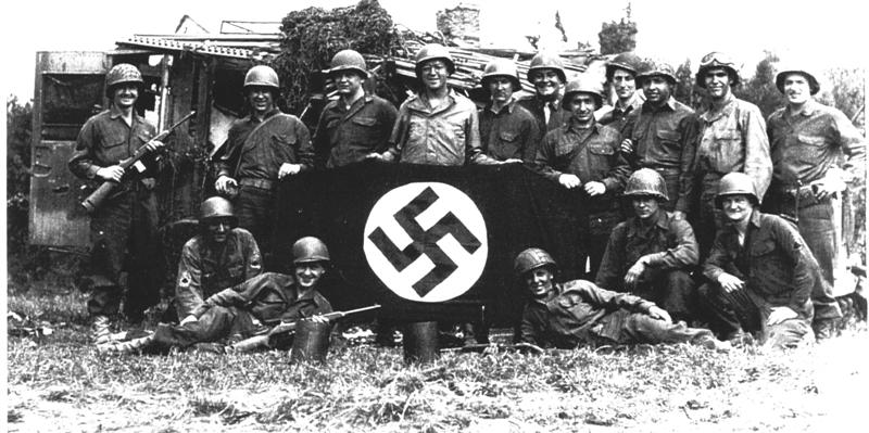 Nazi Soldiers Holding Nazi Symbol 